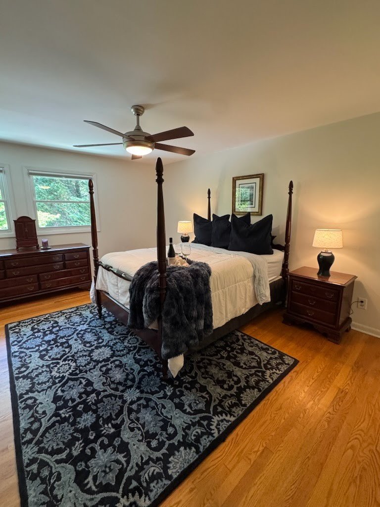 A primary bedroom, after staging
