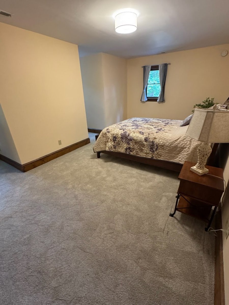 A guest bedroom, before staging
