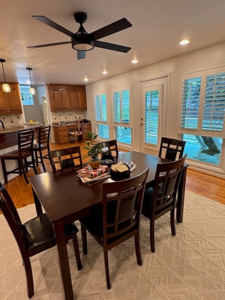 An open kitchen and dining area, after staging